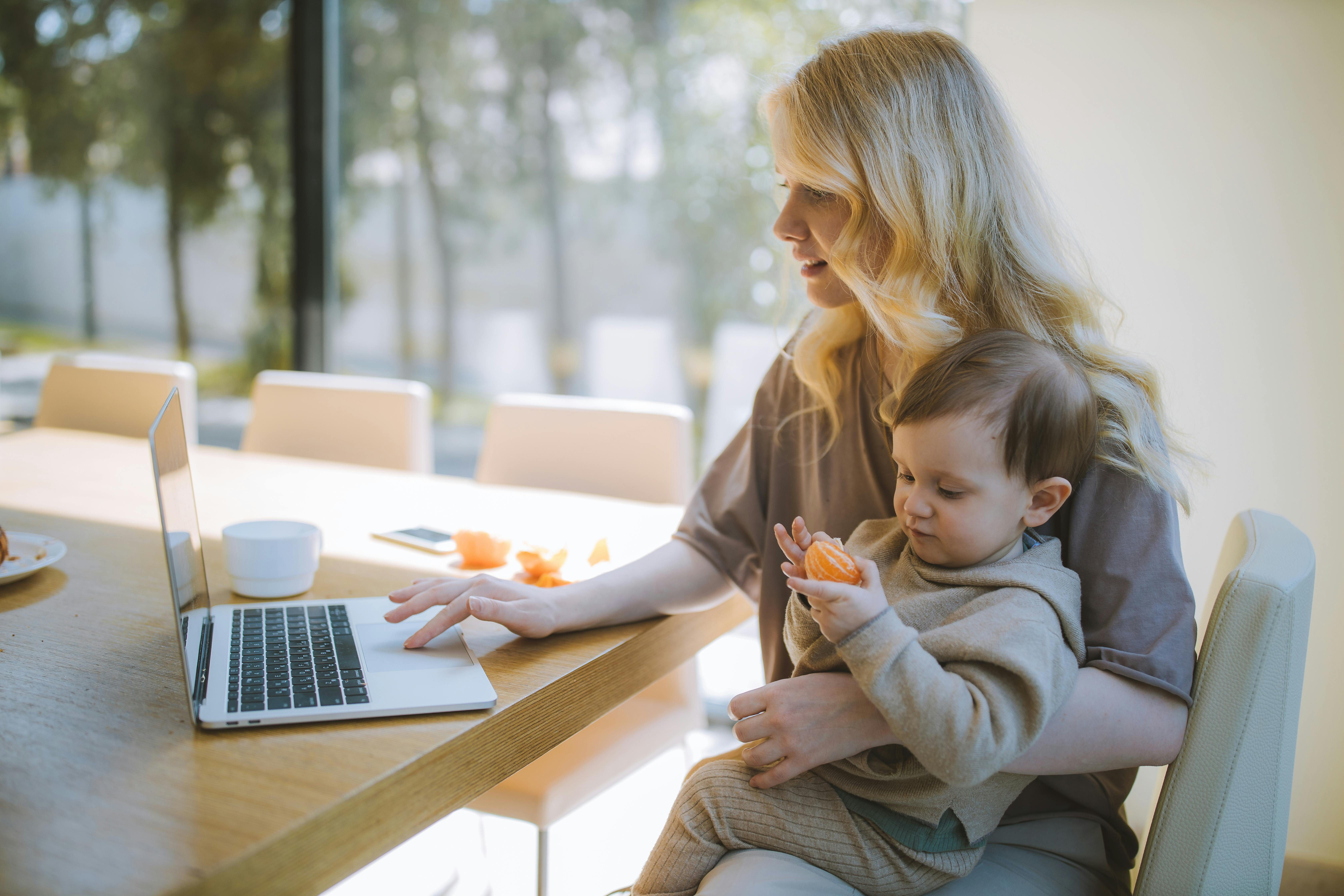 Mum and son on laptop